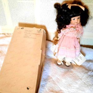 Marie osmond small porcelain dolls